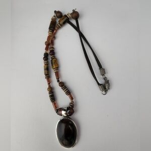 Amber Color & Sterling Silver Pendant On Leather Beaded Necklace